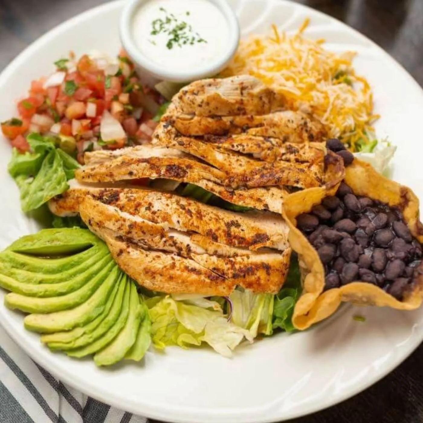 Southwestern chicken salad with avocado, black beans, corn, and grilled chicken